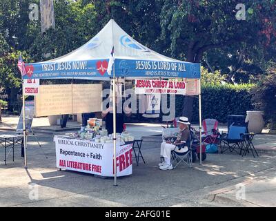 Evangelist booth in Balboa Park, San Diego. Jesus Christ Is Lord, Not a Swear Word. California, USA. August 22nd, 2019 Stock Photo