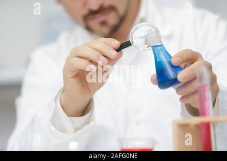 scientist doing experiments in a laboratory Stock Photo