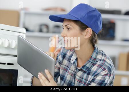 female technician using her tablet Stock Photo