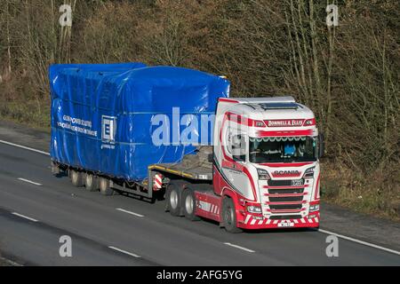 Donnell & Ellis wide load scania S580 STGO CAT2 driving on M61 at Manchester, UK Stock Photo