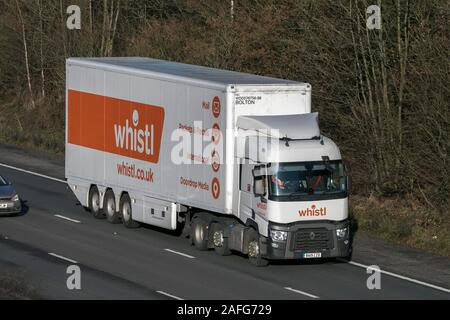 Whistl Haulage delivery trucks, lorry, transportation, truck, cargo carrier, Renault vehicle, commercial transport, industry, M6 at Lancaster, UK Stock Photo