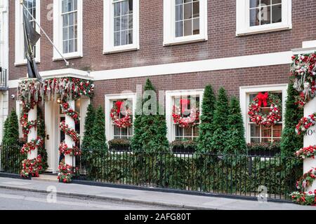 Christmas decorations on The Arts Club, 40 Dover Street, Mayfair, London Stock Photo