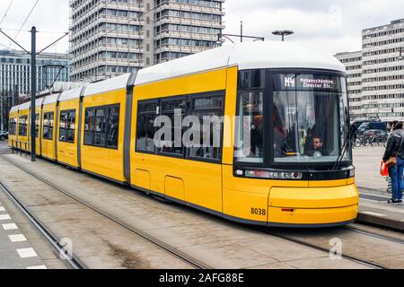 Modern yellow tram on line M4 at Alexanderplatz in Berlin, Germany Stock Photo