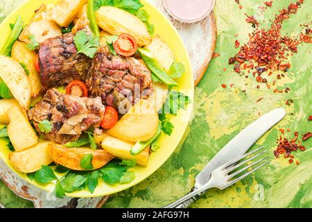 Danish meat baked with new potatoes.Roasted meat Stock Photo