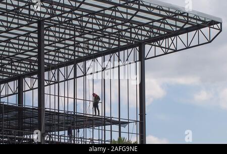 Construction worker working on structural building Stock Photo