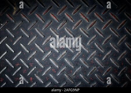 Rusty vintage chequered plate for industry concept design background Stock Photo