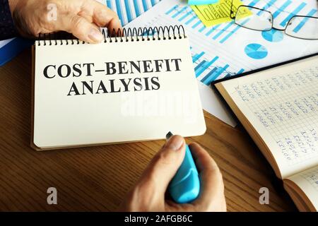 Cost-benefit analysis CBA or BCA on the table. Stock Photo