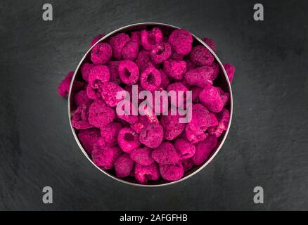 Dried Raspberries on a vintage slate slab as detailed close-up shot; selective focus Stock Photo