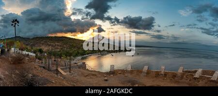 Colorful sunset with Mount Agung and Amed beach in Bali, Indonesia Stock Photo