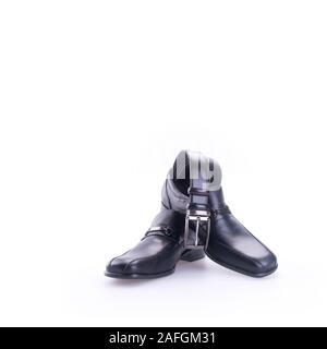 belts and shoe or black colour belts and shoe for men's on background new Stock Photo