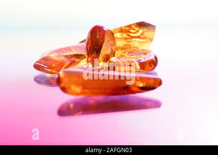 Amber with trapped insects photographed in studio with close up lens Stock Photo