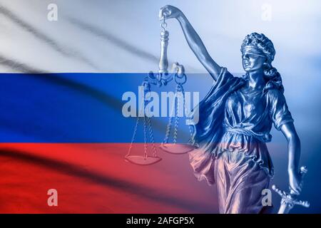 Russian flag with figure of Justice holding scales Stock Photo