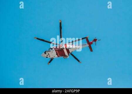 Stockholm, Sweden - June 30, 2019: Rescue helicopter Flying In Sky. Stock Photo