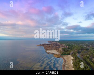 Sunset over the sea. Sea landscape in the evening. Beautiful sunset with dramatic sky. Aerial view Stock Photo