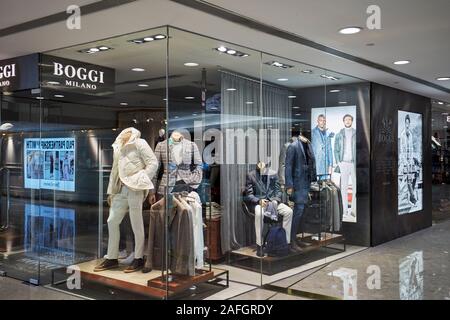 Window of a men's fashion shop in Harbour City shopping mall. Kowloon, Hong Kong, China. Stock Photo