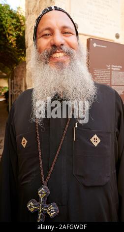 Jerusalem Israel. Portrait of a smiling priest in the old city Stock Photo