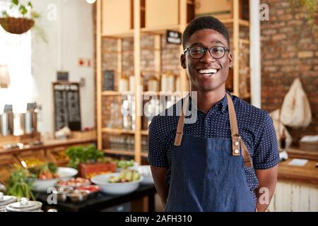 Portrait Of Male Owner Of Sustainable Plastic Free Grocery Store Stock Photo