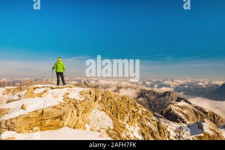 hiking sport woman in mountains Dolomites, Italy Stock Photo