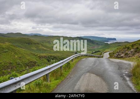 Single track road amongst remote scenery landscape on the Isle of Lewis and Harris, Outer Hebrides, Scotland Stock Photo