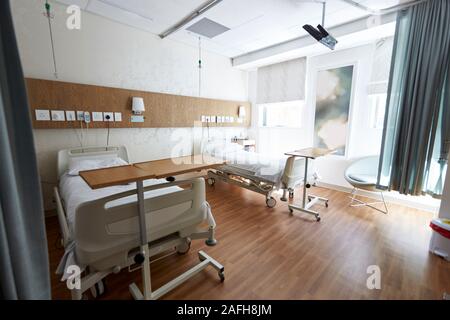 Beds In Empty Hospital Ward Stock Photo