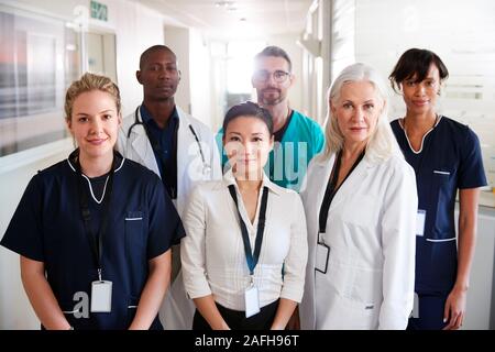 Portrait Of Medical Team Standing In Hospital Corridor Stock Photo