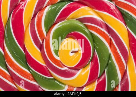 Colorful spiral shaped lollipop close-up and full-frame Stock Photo