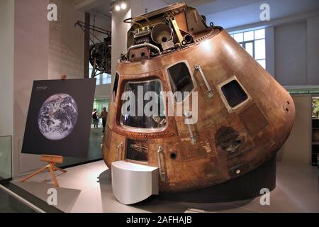 LONDON, UK - MAY 14, 2012: Visitors admire Apollo 10 space capsule at Science Museum in London. With almost 2.8 million annual visitors it is the 5th Stock Photo