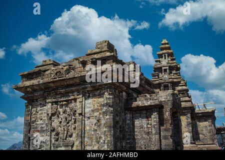 View of an ancient temple Candi Arjuna in touristic site of Dieng, Central Java, Indonesia Stock Photo