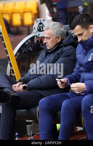 Wolverhampton, West Midlands, UK. 15th December, 2019. Tottenham Hotspur manager Jose Mourinho in the dugout at Molineux. Stock Photo