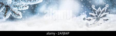 Ice christmas star on snow. Merry Xmas concept Stock Photo