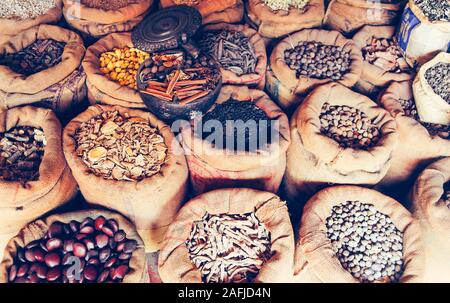 Big variety of Indian colorful spices on the market. Stock Photo