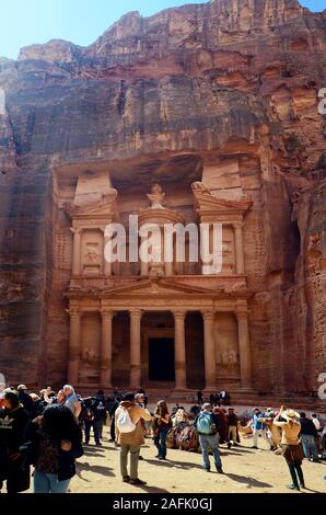Petra, Jordan - March 06, 2019: Unidentified people on Treasury aka Al-Khazneh, landmark in the UNESCO World heritage site of ancient Petra