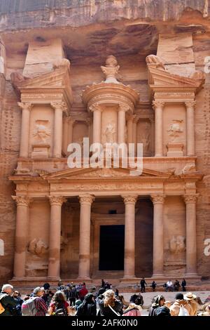 Petra, Jordan - March 06, 2019: Unidentified people on Treasury aka Al-Khazneh, landmark in the UNESCO World heritage site of ancient Petra