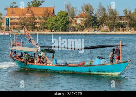 Fishing boat on the Praek Tuek Chhu River in this old French colonial river port; Kampot, Kampot Province, Cambodia Stock Photo