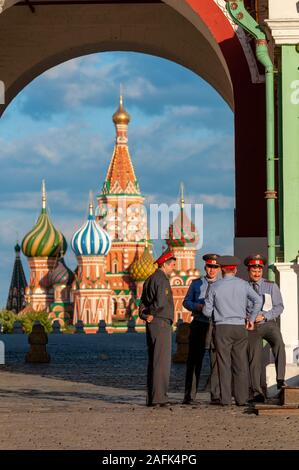 Policemen in front of St Basil's Cathedral in Red Square, Moscow, Russia Stock Photo