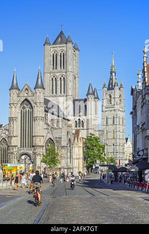 Saint Nicholas' church / Sint-Niklaaskerk and bell tower of the belfry in the old historic city center of Ghent / Gent, East Flanders, Belgium Stock Photo