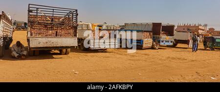 Khartoum, Sudan, ca. February 8., 2019: Truck with open tailgates, filled with bricks from a brick factory on the outskirts of Khartoum Stock Photo