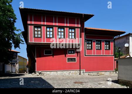 Plovdiv, Bulgaria - June 08, 2018: Building in traditional structure and cobbled street in old town district Stock Photo