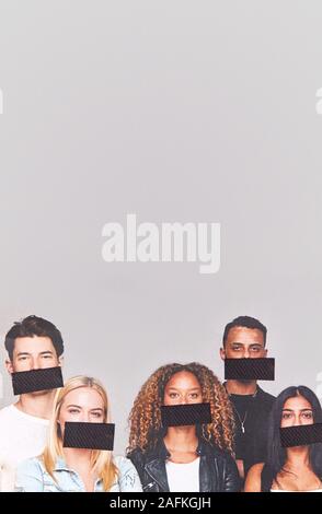 Freedom Of Speech Concept Showing Group Of Young People With Mouths Covered With Tape Stock Photo