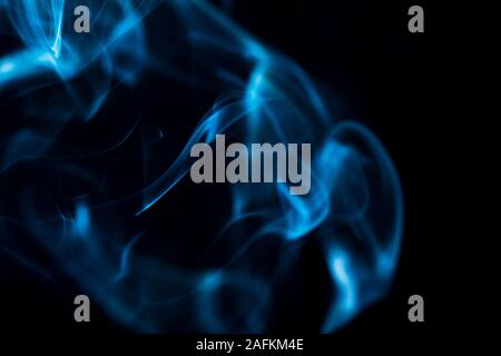 abstract background with blue smoke on black, smoky abstract background Stock Photo