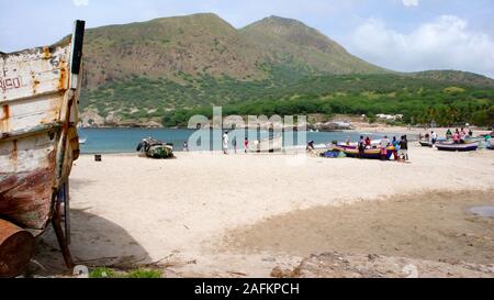 Tarrafal, Santiago / Cape Verde - 12. November, 2015: fishermen and villagers check on the catch of the day on the beach of Tarrafal in Cape Verde Stock Photo