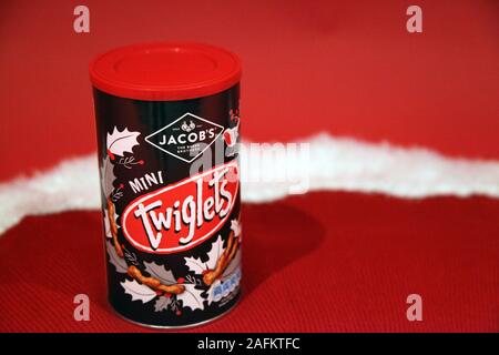 Tin of Jacobs Twiglets Christmas 2019 edition, displayed in Xmas setting Stock Photo