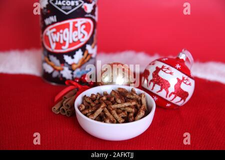 Jacobs Twiglets Christmas 2019 edition, displayed in Xmas setting with bauble and cinnamon stick Stock Photo