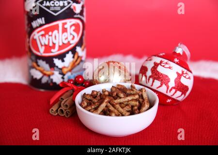 Jacobs Twiglets Christmas 2019 edition, displayed in Xmas setting with bauble and cinnamon stick Stock Photo