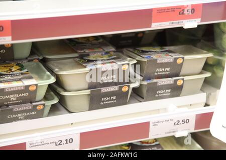 Sainsburys Fish Pie microwave meal, on sale in supermarket store, December 2019 Stock Photo