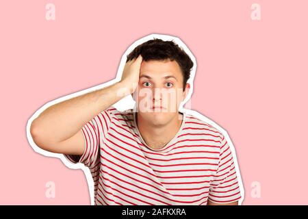 Studio shot of young man looking shocked with hand on head. emotional guy isolated on white background Magazine collage style with trendy color. Stock Photo