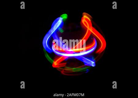 Movement of neon light in the dark Stock Photo