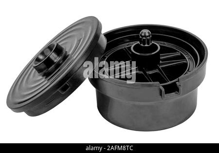 Kit for developing 35mm photo film. Kit for development film includes film spiral reels and developing tank. Isolated on a white background. Stock Photo