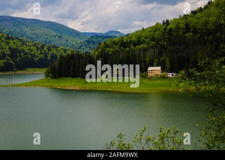 Vidraru Lake landscape from Romania Transfagaras, dam in the montains nature travel and tourism in Fagaras Stock Photo