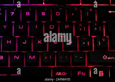 Alphabetical backlit Gaming Keyboard of a computer. Stock Photo
